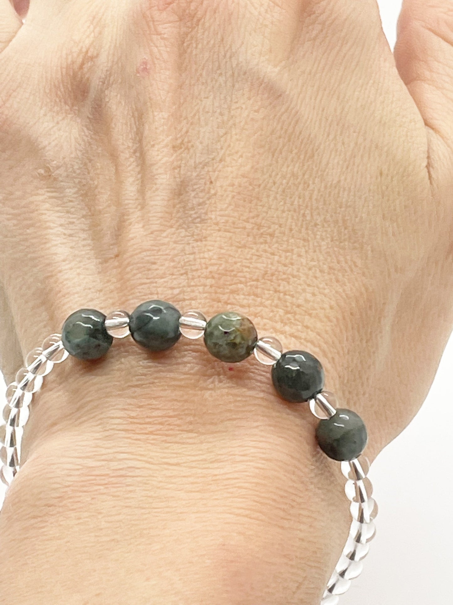 Crystal Green and Clear Stone Beaded Bracelet with Clear Quartz, Bloodstone and Sterling Silver Clasp.. Clear stone with green stones in middle.