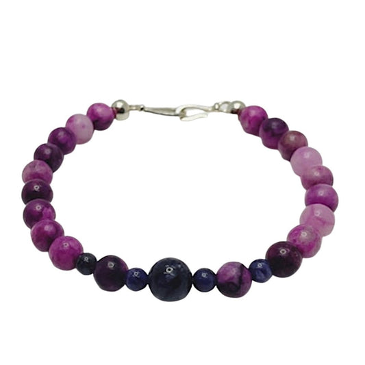 Sugalite and Charoite Gemstone Bracelet with Sterling Silver Clasp. Shades of purple.