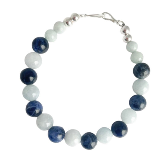 Sodalite and Aquamarine Gemstone Bracelet with Sterling Silver Clasp. White and dark blue in color.