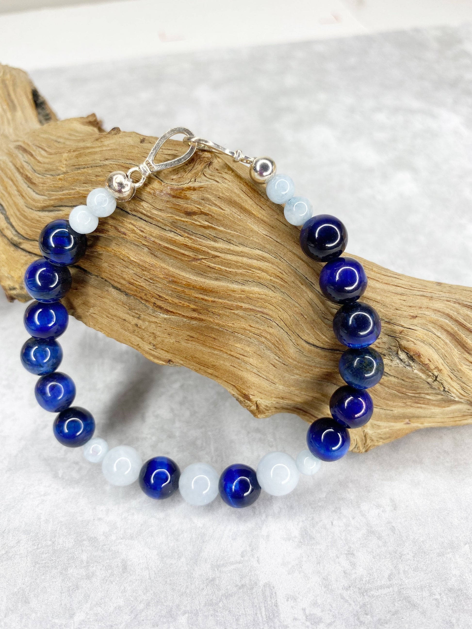 Throat Chakra Crystal Beaded Bracelet with Sterling Silver Clasp. Aquamarine and Blue Tiger’s Eye crystal round beads.