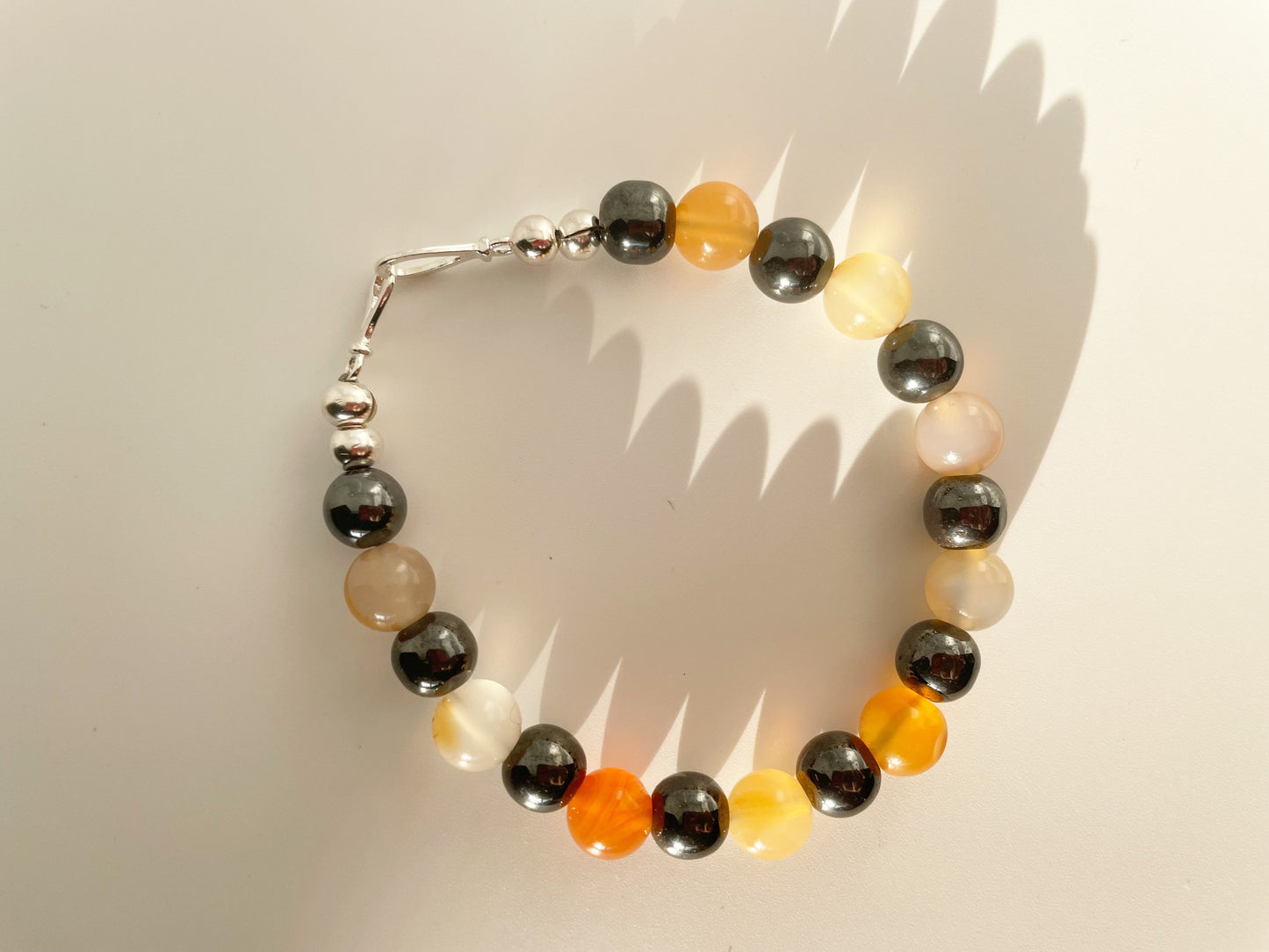 Courage and protection Crystal Bracelet:  Hematite and Carnelian with Sterling Silver Clasp