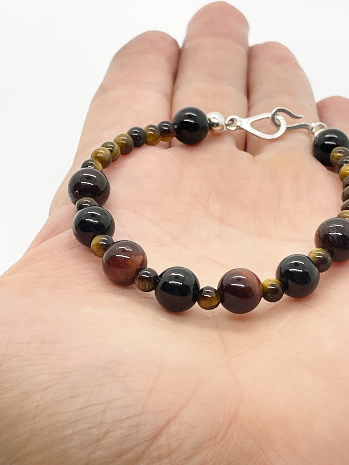 Calm and Clear Goal Getter Crystal Beaded Gemstone Bracelet with Tiger’s Eye, Black Onyx and Red Tiger’s Eye with Sterling Silver Closure