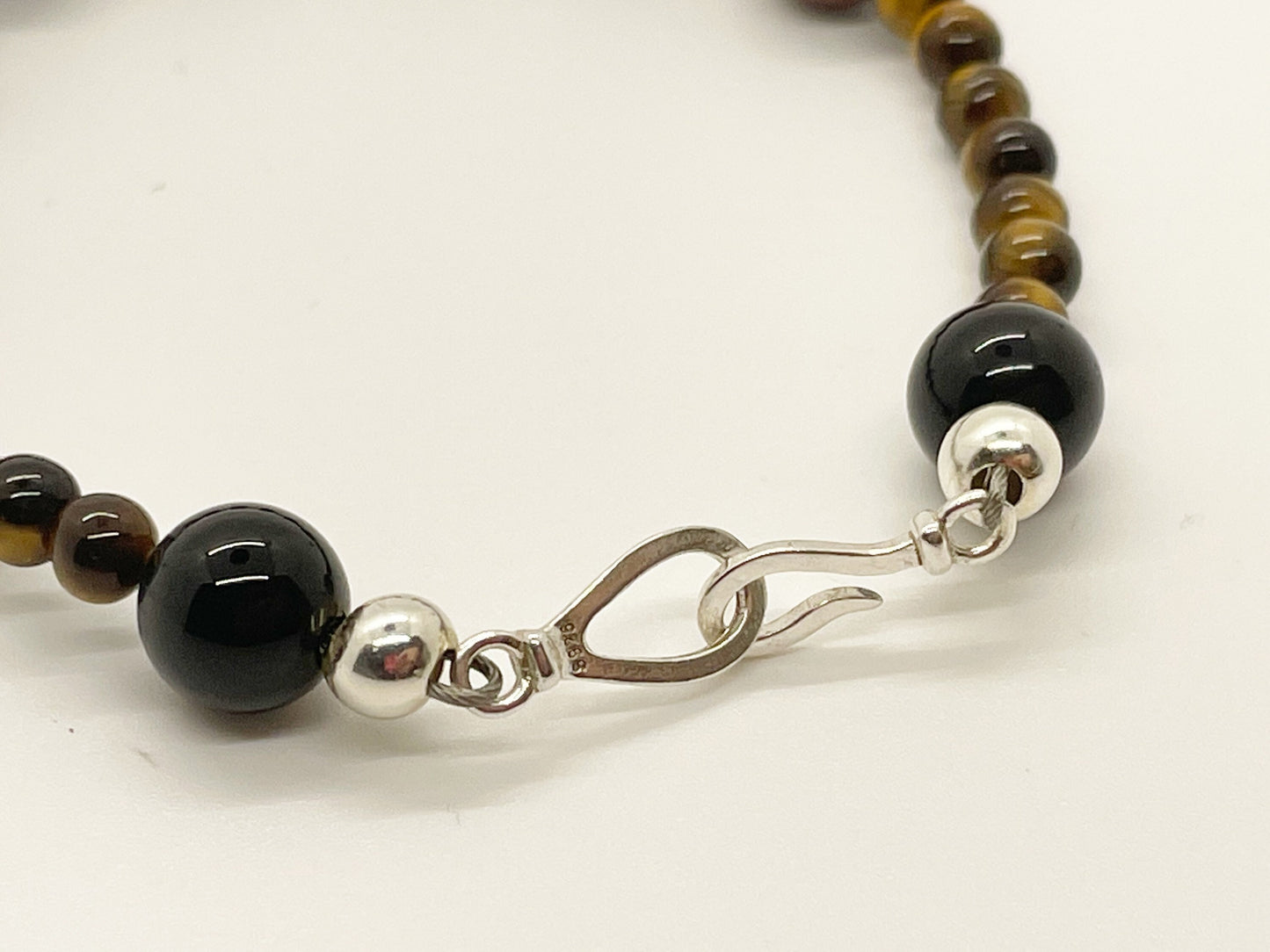 Calm and Clear Goal Getter Crystal Beaded Gemstone Bracelet with Tiger’s Eye, Black Onyx and Red Tiger’s Eye with Sterling Silver Closure