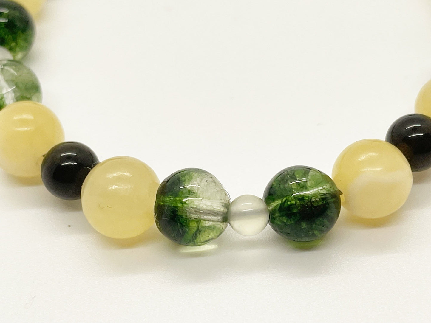 Life’s Purpose Crystal Gemstone Breathbeads Bracelet with Peridot, Yellow Jade, New Jade, and Gold Obsidian. Sterling Silver Clasp