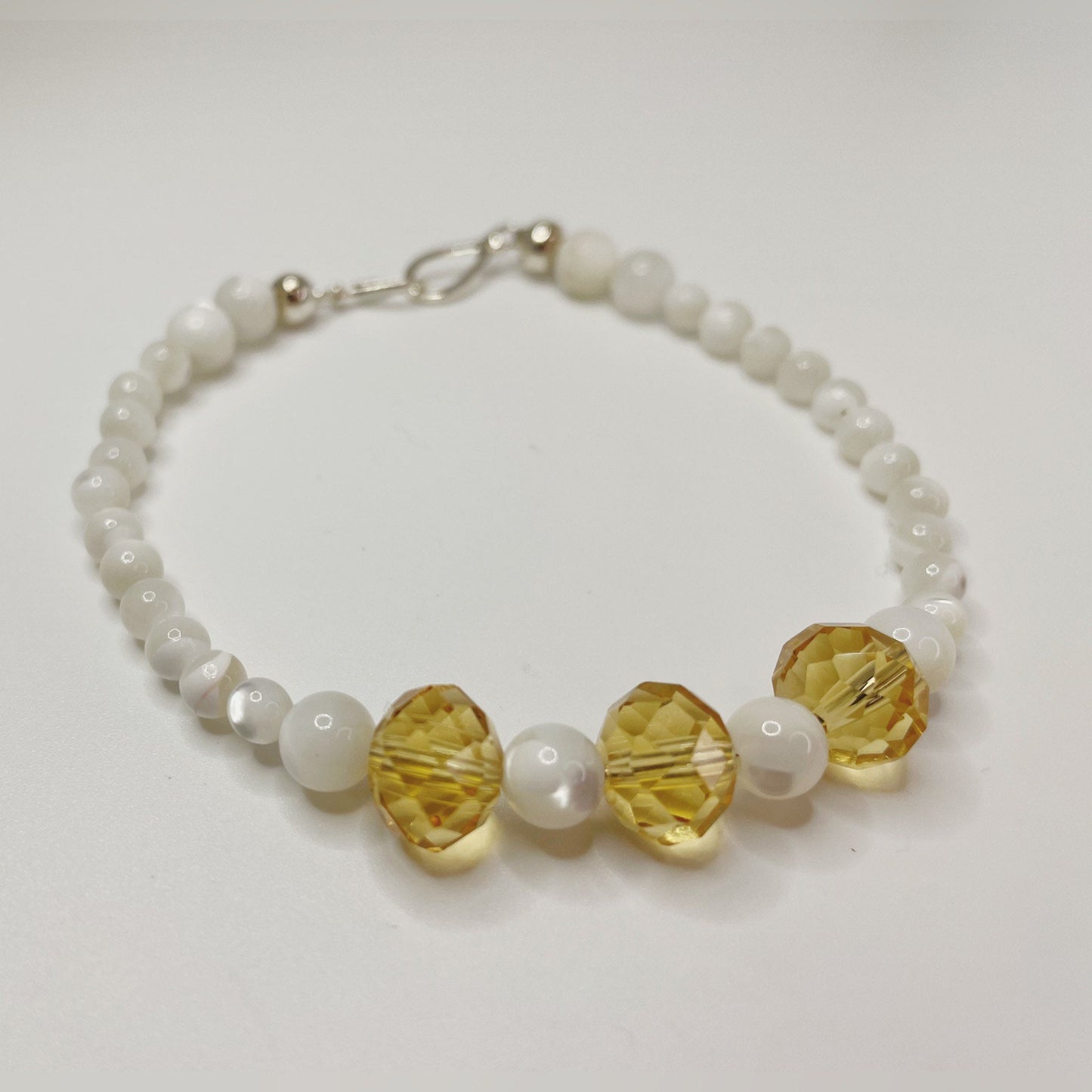 Joyous Prosperity Gemstone Bracelet. Faceted Citrine and Mother of Pearl Beaded Bracelet with Sterling Silver