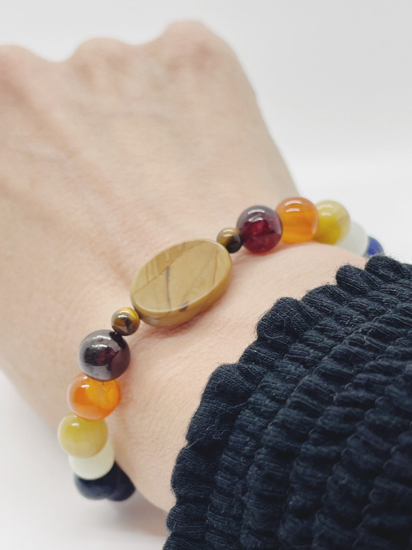 Crystal Bead Chakra Bracelet. Picture Jasper, Tiger’s Eye, Garnet, Carnelian, Yellow Tiger’s Eye, Cave Calcite, Lapis, Charoite, Tourmaline