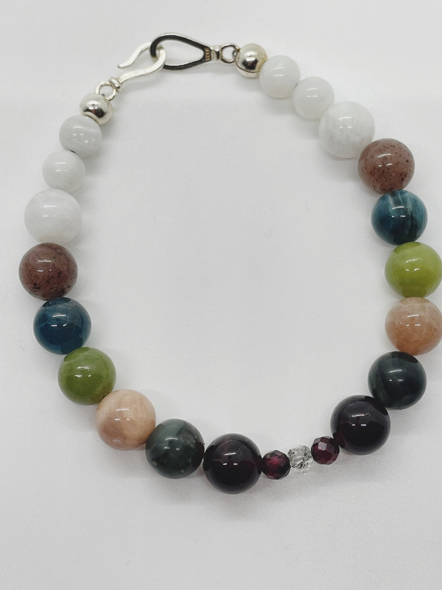 Crystal Beaded Chakra Bracelet. Garnet, Kerkimer Quartz, Bloodstone, Pink Moonstone, Jade, Apatite, Purple Aventurine, Pink Moonstone