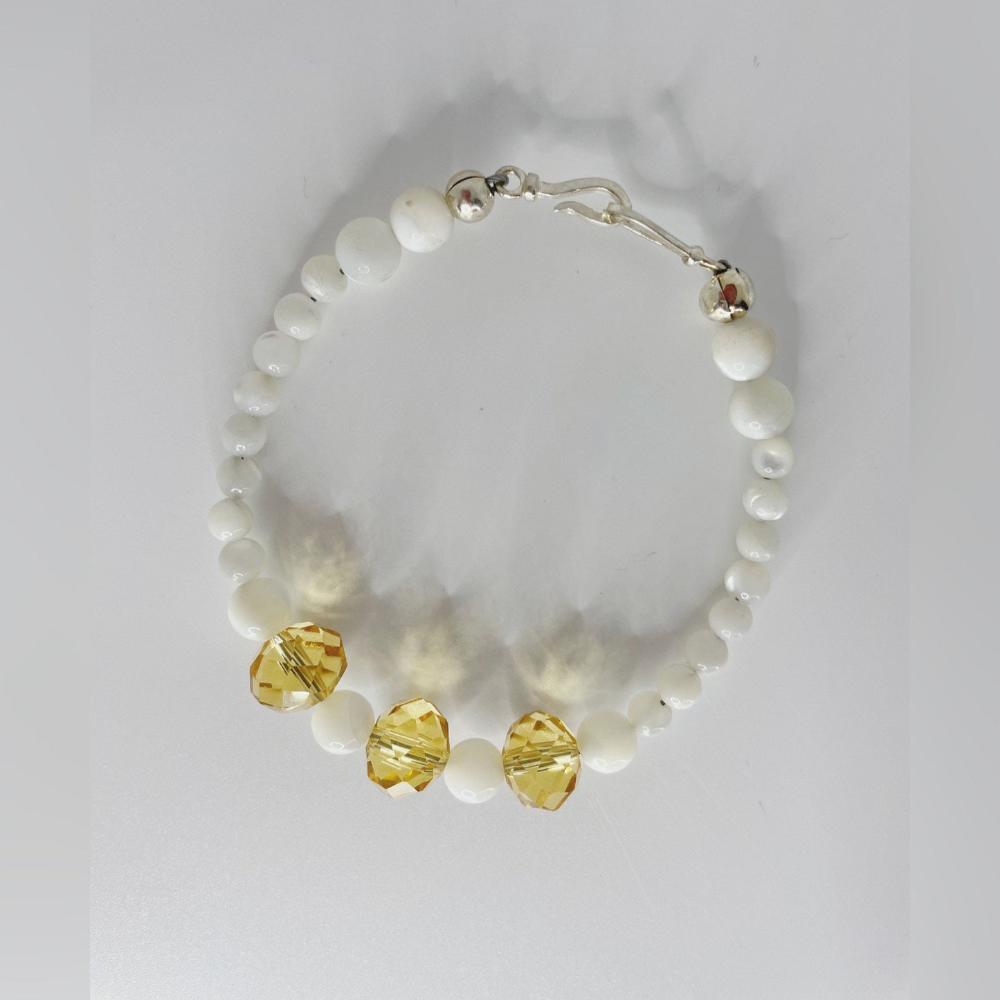 Joyous Prosperity Gemstone Bracelet. Faceted Citrine and Mother of Pearl Beaded Bracelet with Sterling Silver