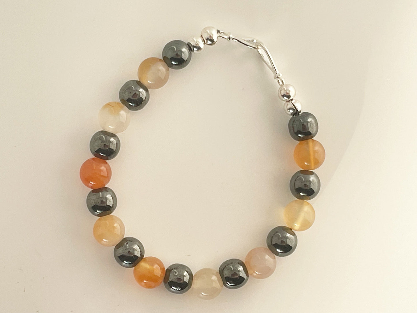 Courage and protection Crystal Bracelet:  Hematite and Carnelian with Sterling Silver Clasp