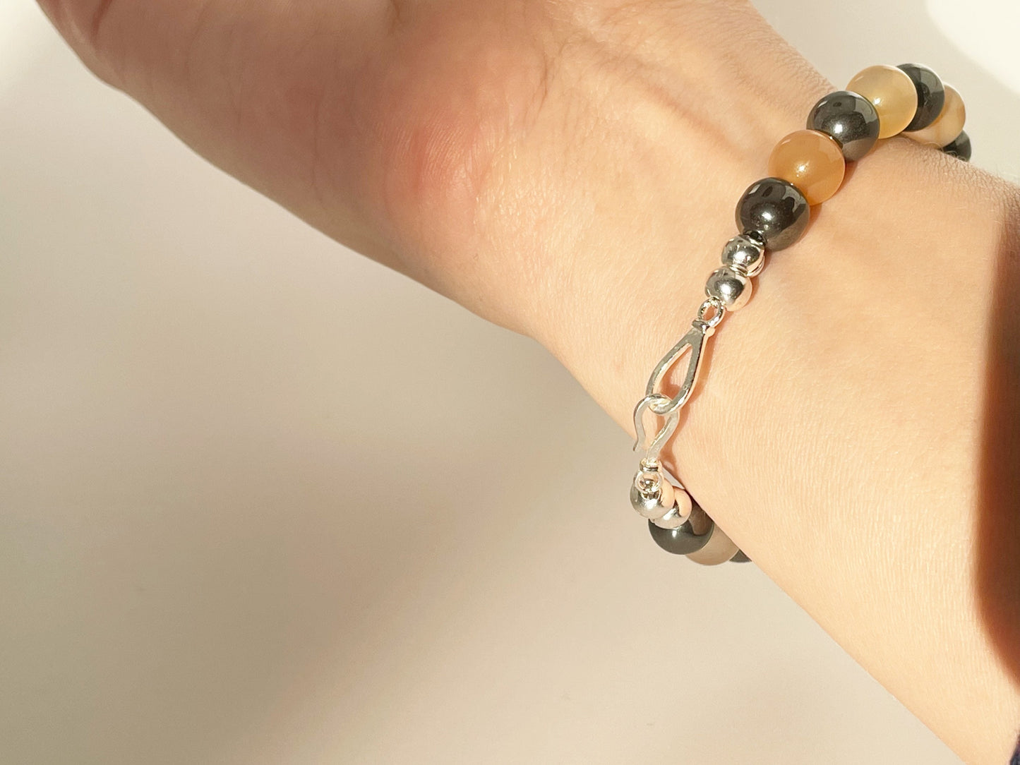 Courage and protection Crystal Bracelet:  Hematite and Carnelian with Sterling Silver Clasp