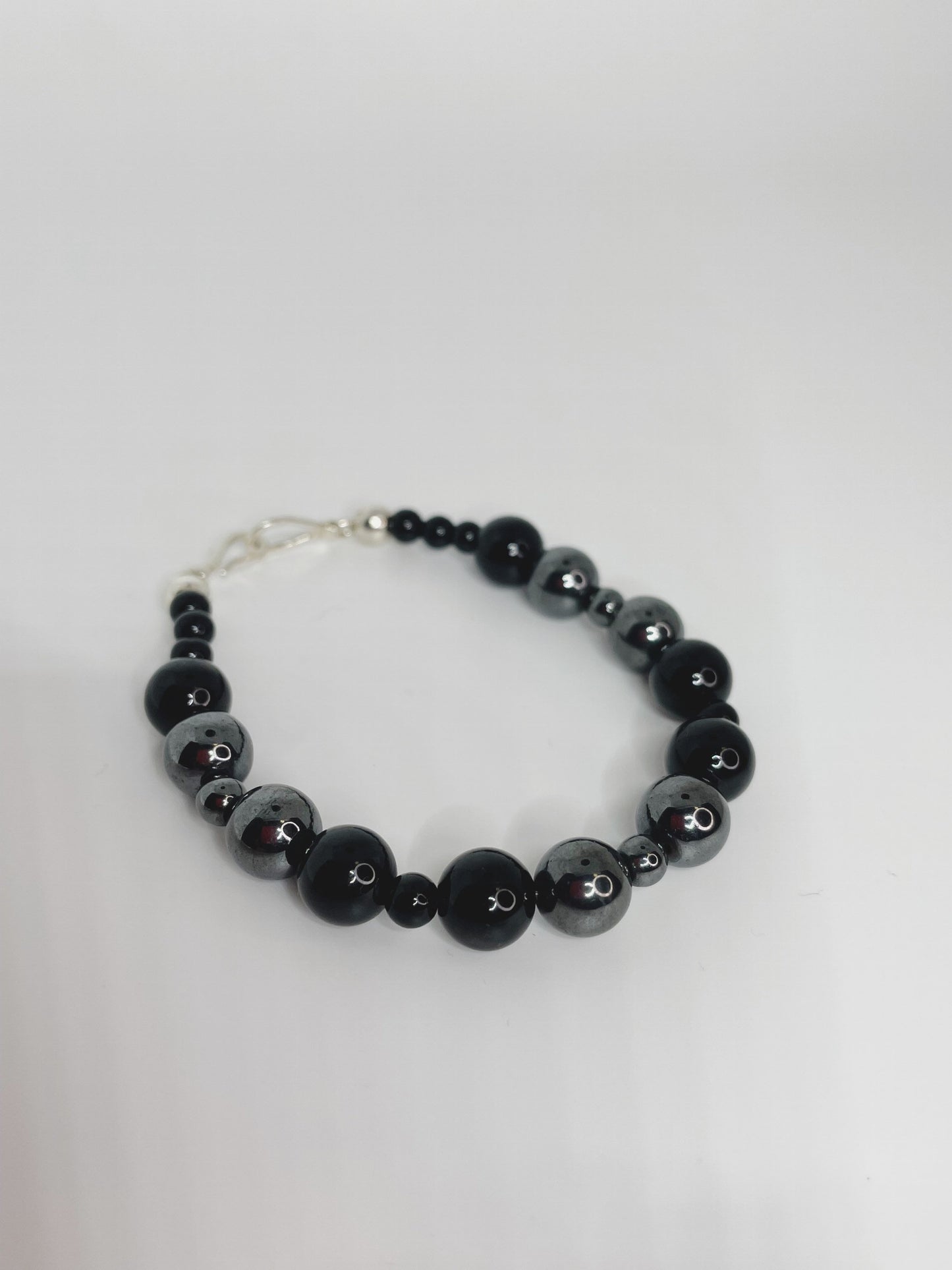 Hematite and Black Onyx Breathbeads Bracelet with Sterling Silver Clasp