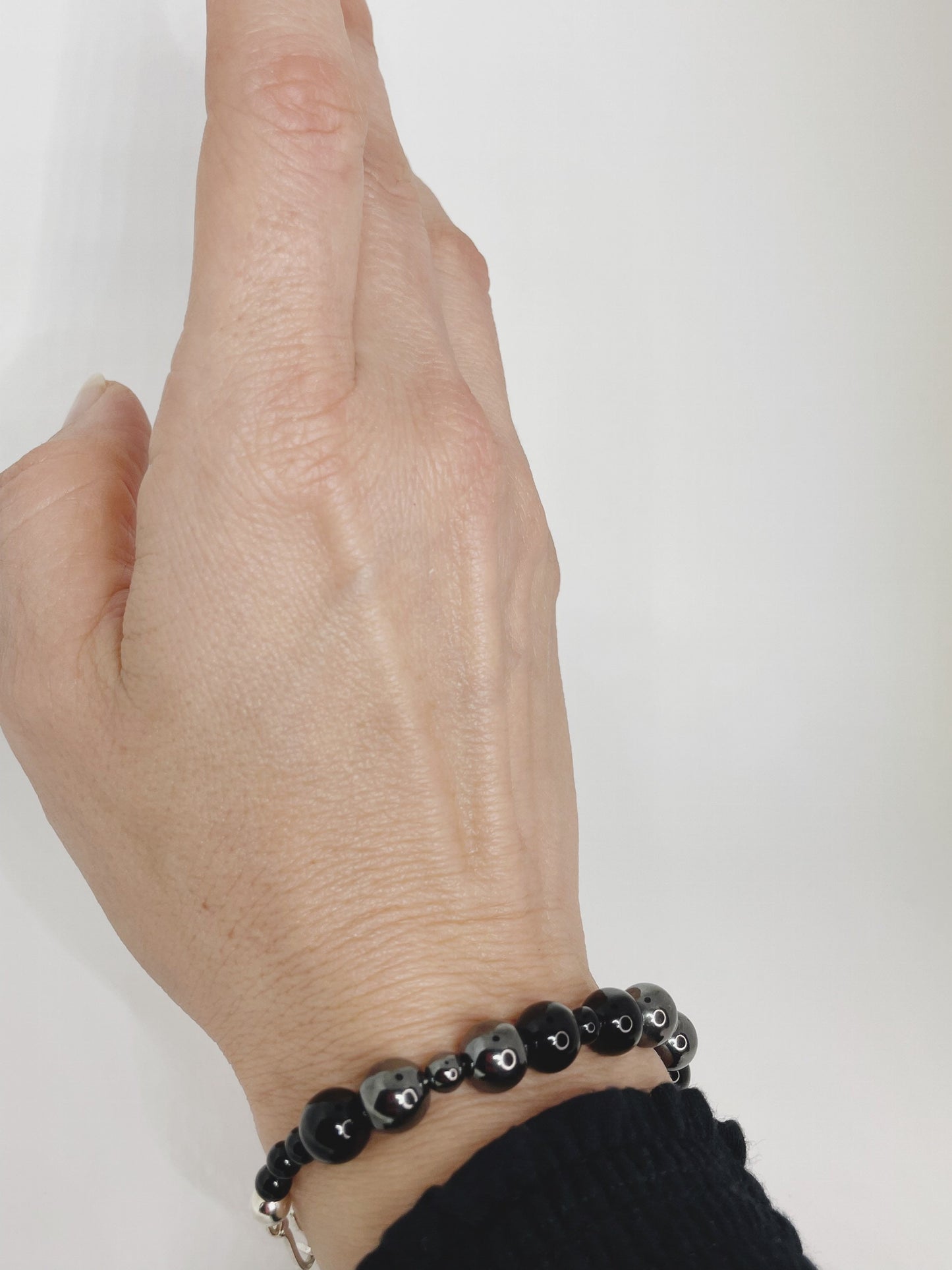 Hematite and Black Onyx Breathbeads Bracelet with Sterling Silver Clasp