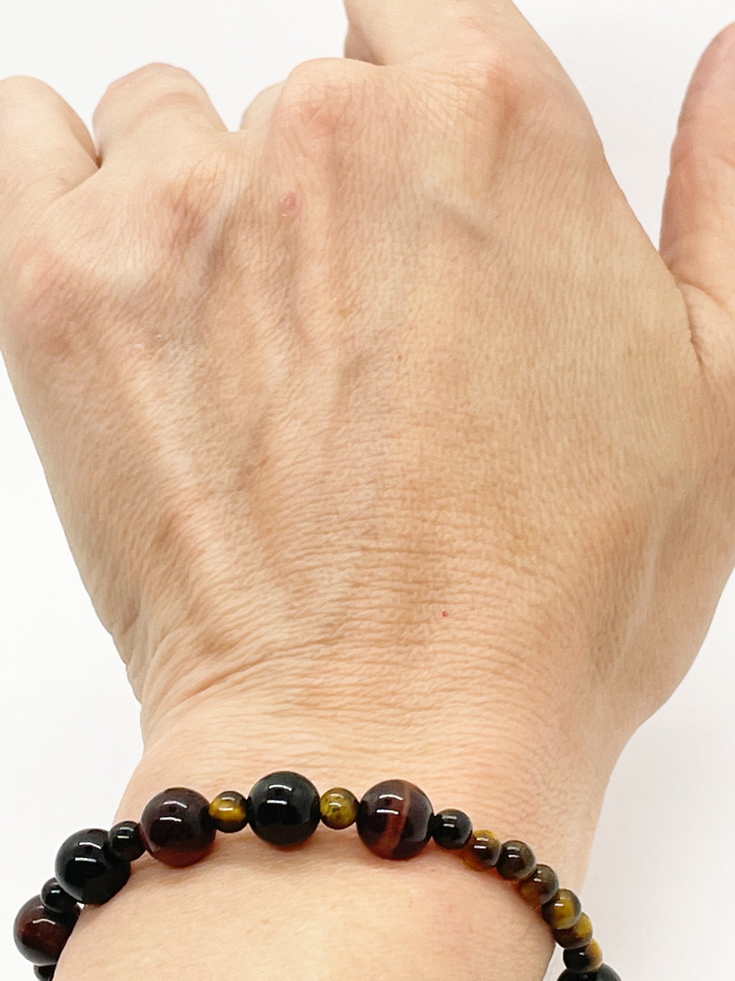 Calm and Clear Goal Getter Crystal Beaded Gemstone Bracelet with Tiger’s Eye, Black Onyx and Red Tiger’s Eye with Sterling Silver Closure