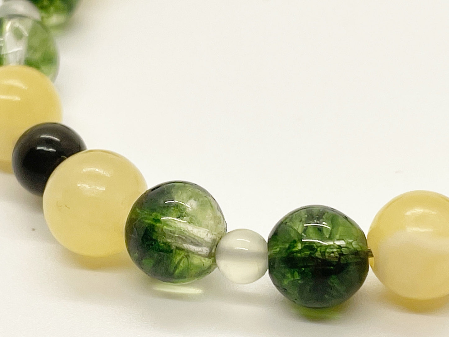 Life’s Purpose Crystal Gemstone Breathbeads Bracelet with Peridot, Yellow Jade, New Jade, and Gold Obsidian. Sterling Silver Clasp