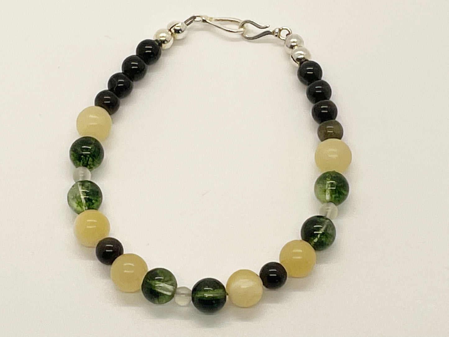 Life’s Purpose Crystal Gemstone Breathbeads Bracelet with Peridot, Yellow Jade, New Jade, and Gold Obsidian. Sterling Silver Clasp