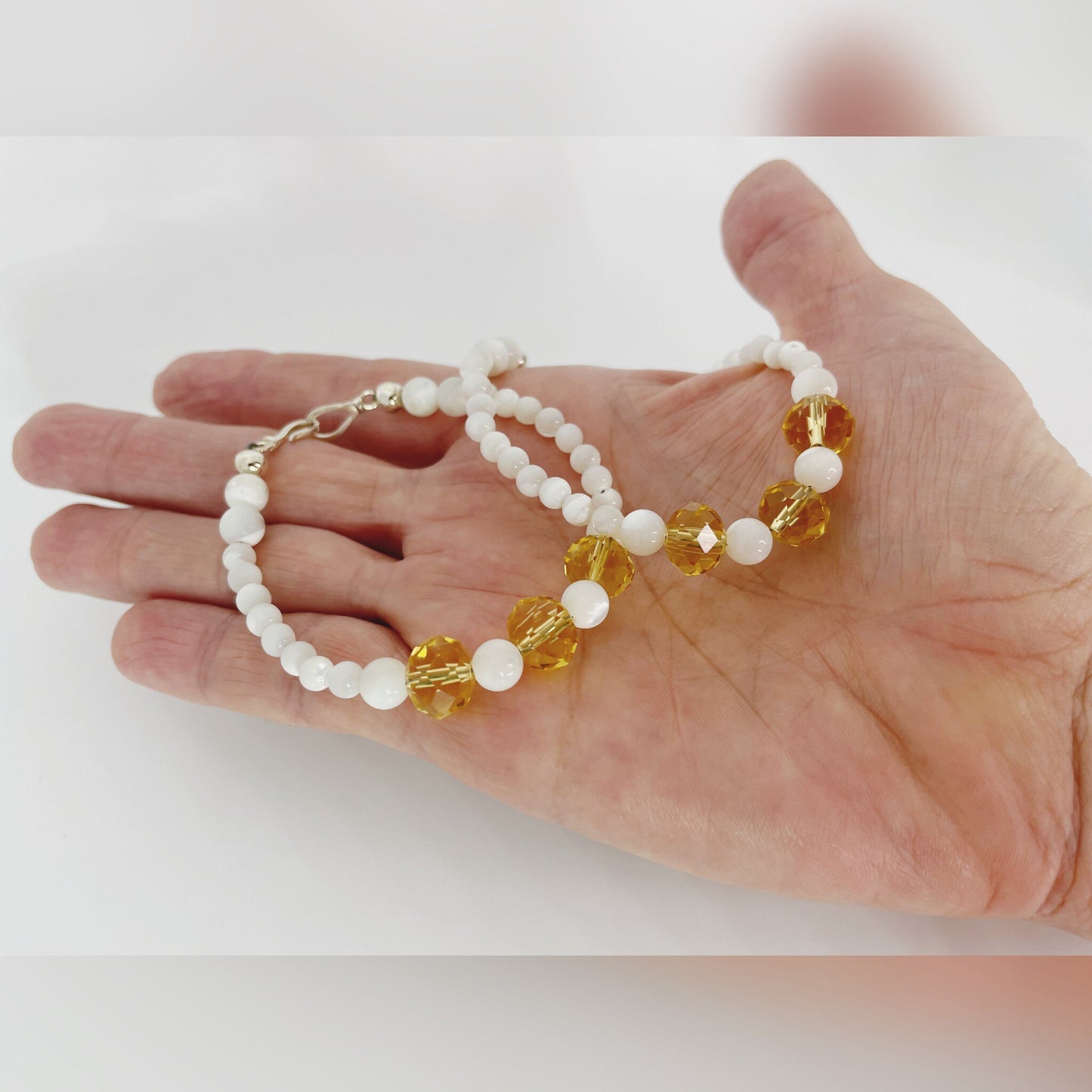 Joyous Prosperity Gemstone Bracelet. Faceted Citrine and Mother of Pearl Beaded Bracelet