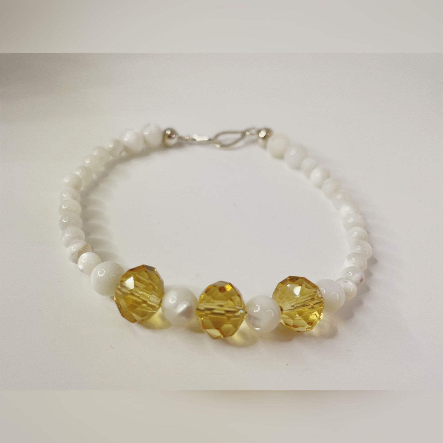 Joyous Prosperity Gemstone Bracelet. Faceted Citrine and Mother of Pearl Beaded Bracelet with Sterling Silver