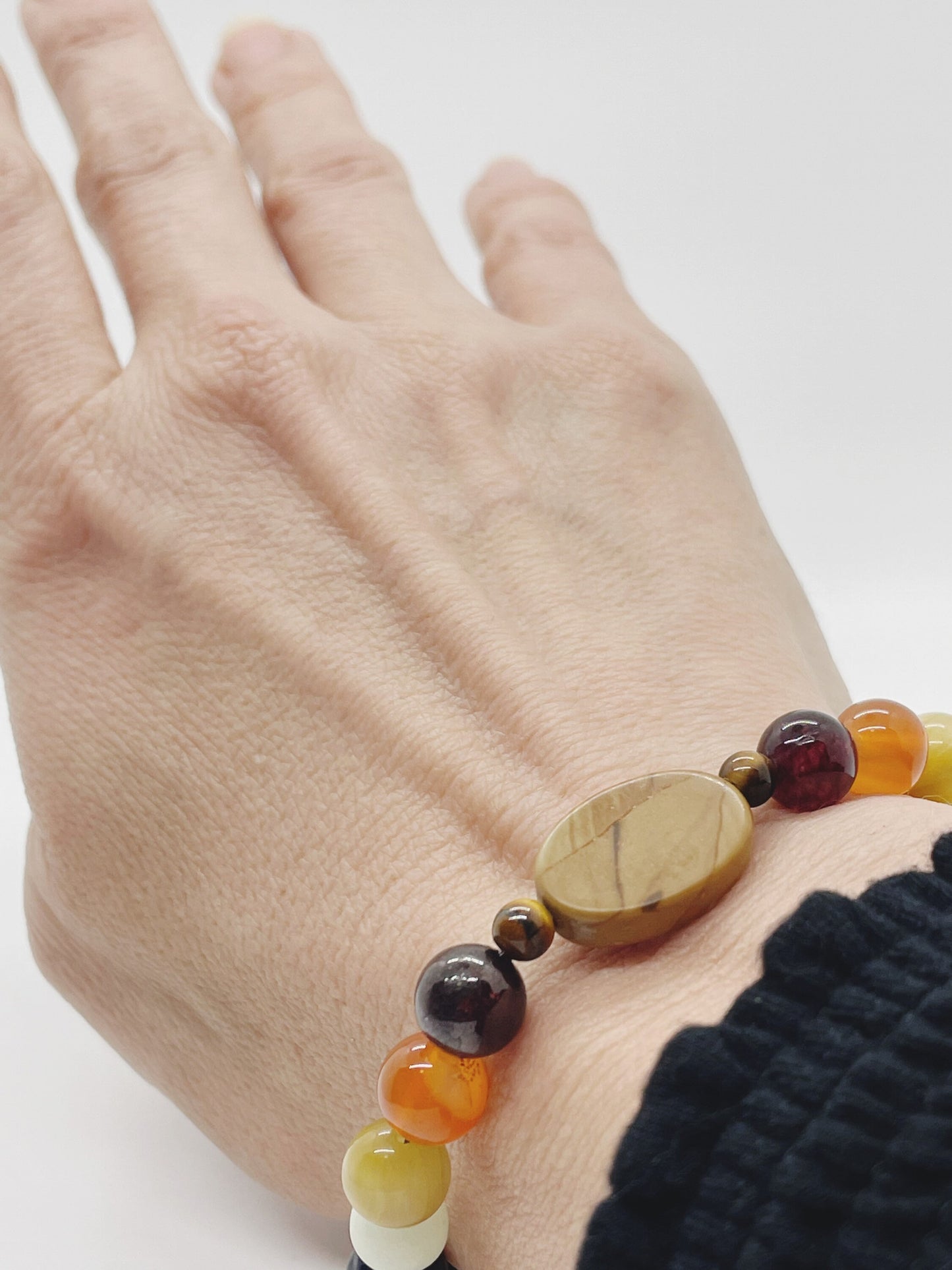 Crystal Bead Chakra Bracelet. Picture Jasper, Tiger’s Eye, Garnet, Carnelian, Yellow Tiger’s Eye, Cave Calcite, Lapis, Charoite, Tourmaline