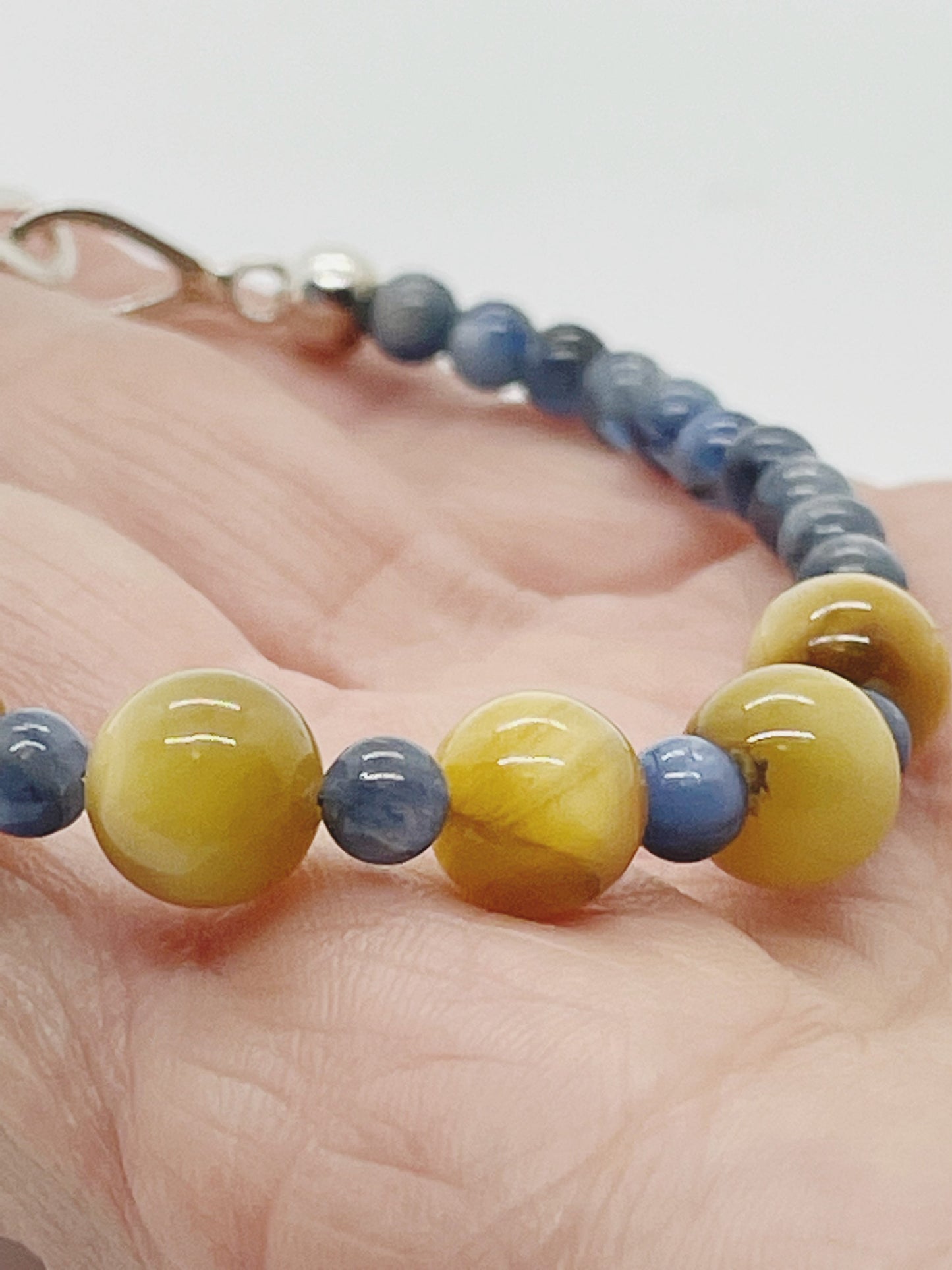 Crystal Beaded Gemstone Bracelet. Blue Kyanite, Yellow Tiger’s Eye and Sterling Silver