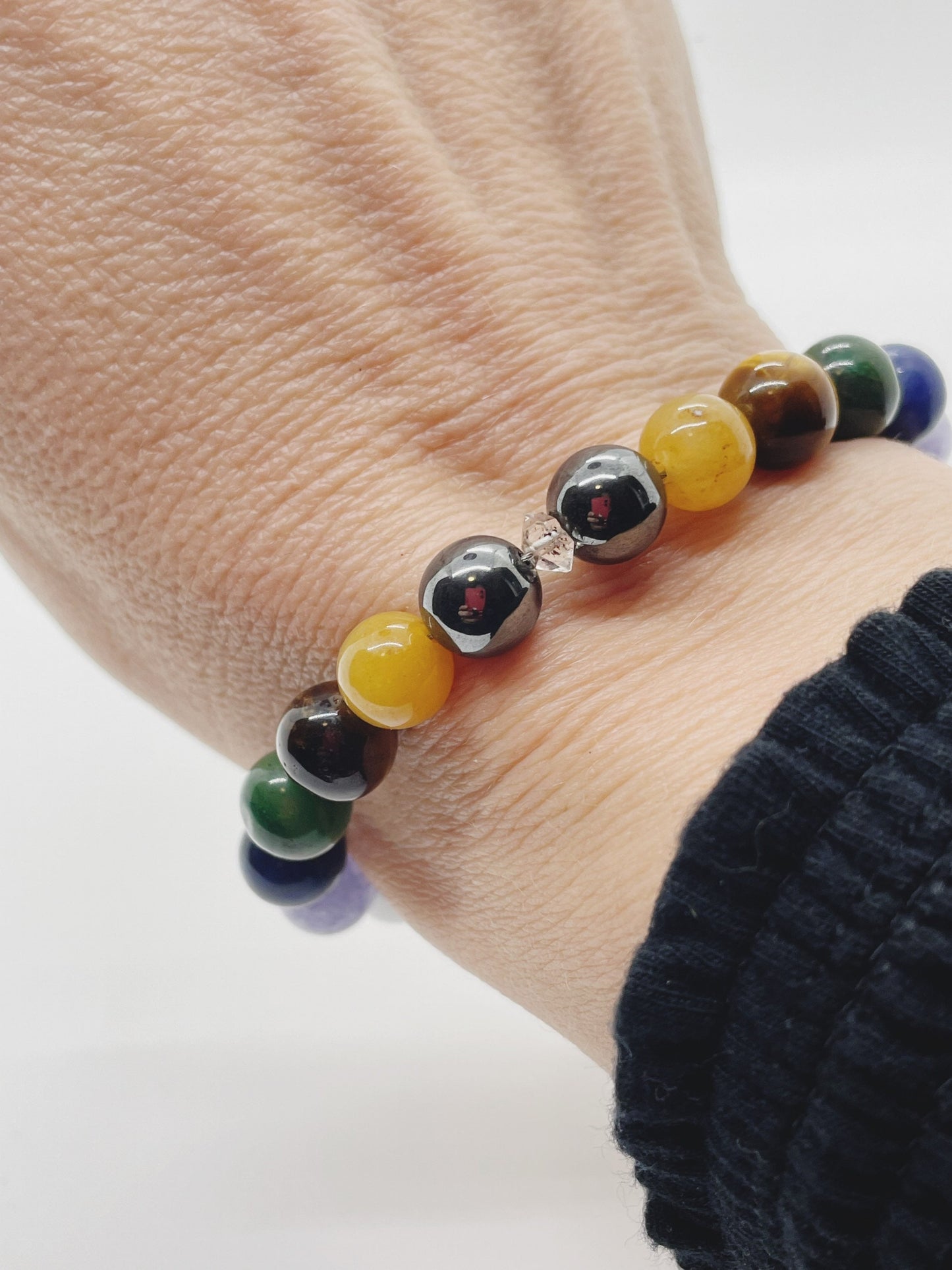 Crystal Beaded Chakra Gemstone Bracelet. Hematite, Serpentine, Moonstone, Tiger’s Eye, Verdite, Sodalite, Tanzanite, Aquamarine, Herkimer