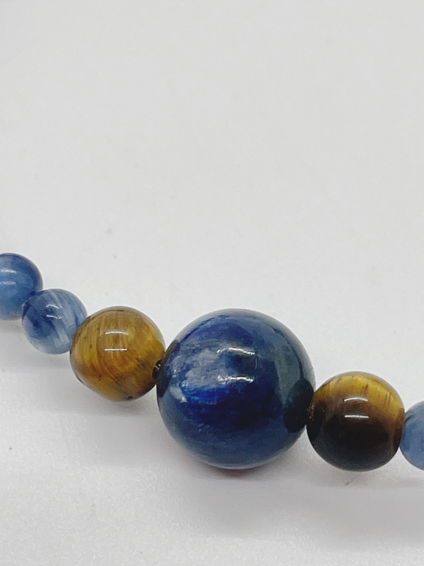 Crystal Gemstone Beaded Bracelet. Blue Kyanite, Tiger's Eye and Sterling Silver