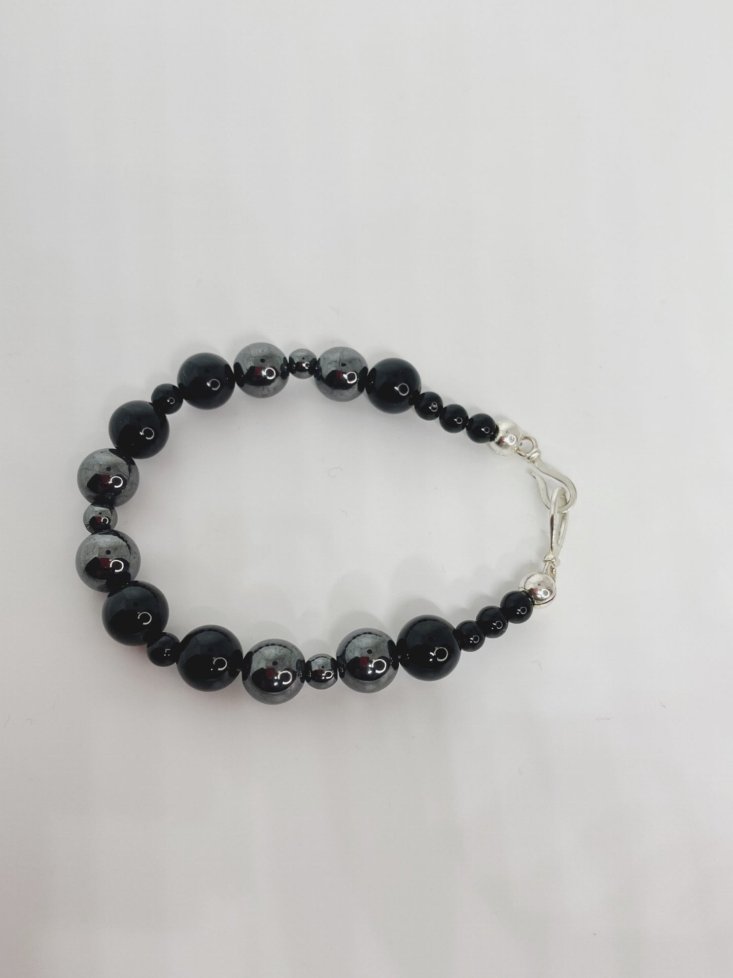 Hematite and Black Onyx Breathbeads Bracelet with Sterling Silver Clasp