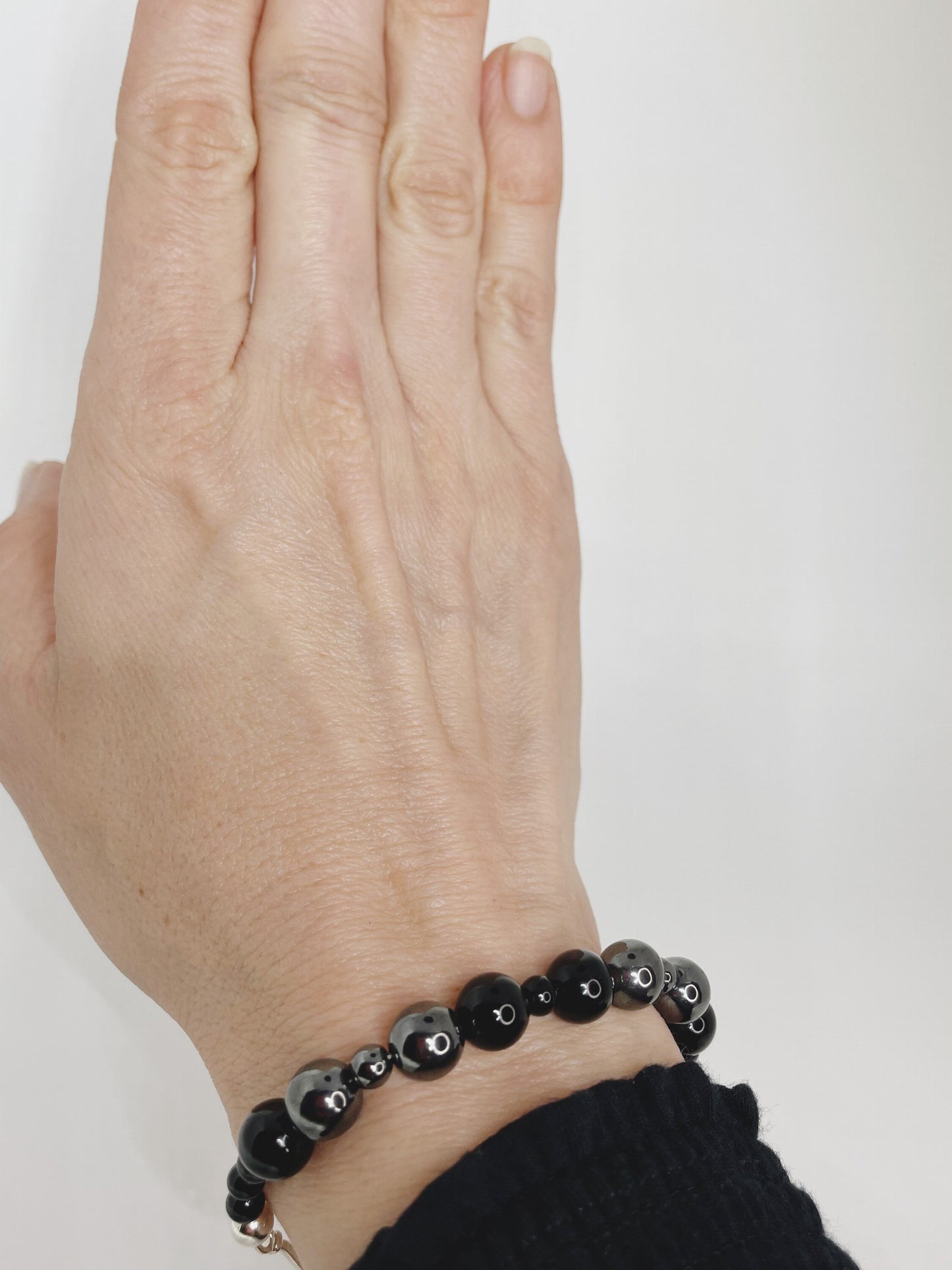 Hematite and Black Onyx Breathbeads Bracelet with Sterling Silver Clasp