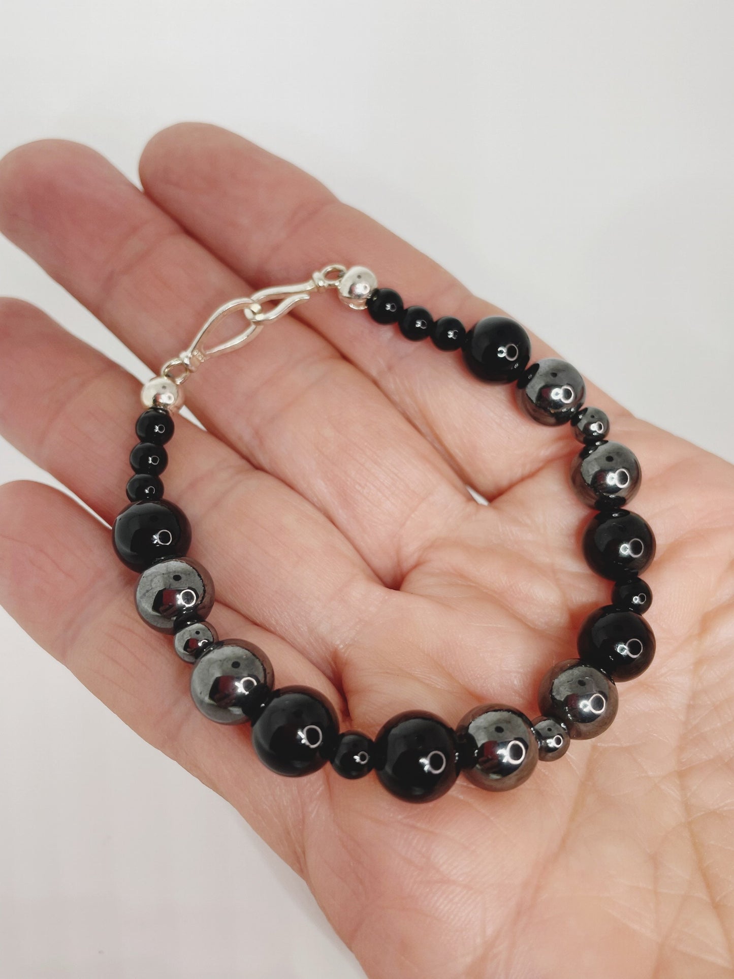 Hematite and Black Onyx Breathbeads Bracelet with Sterling Silver Clasp