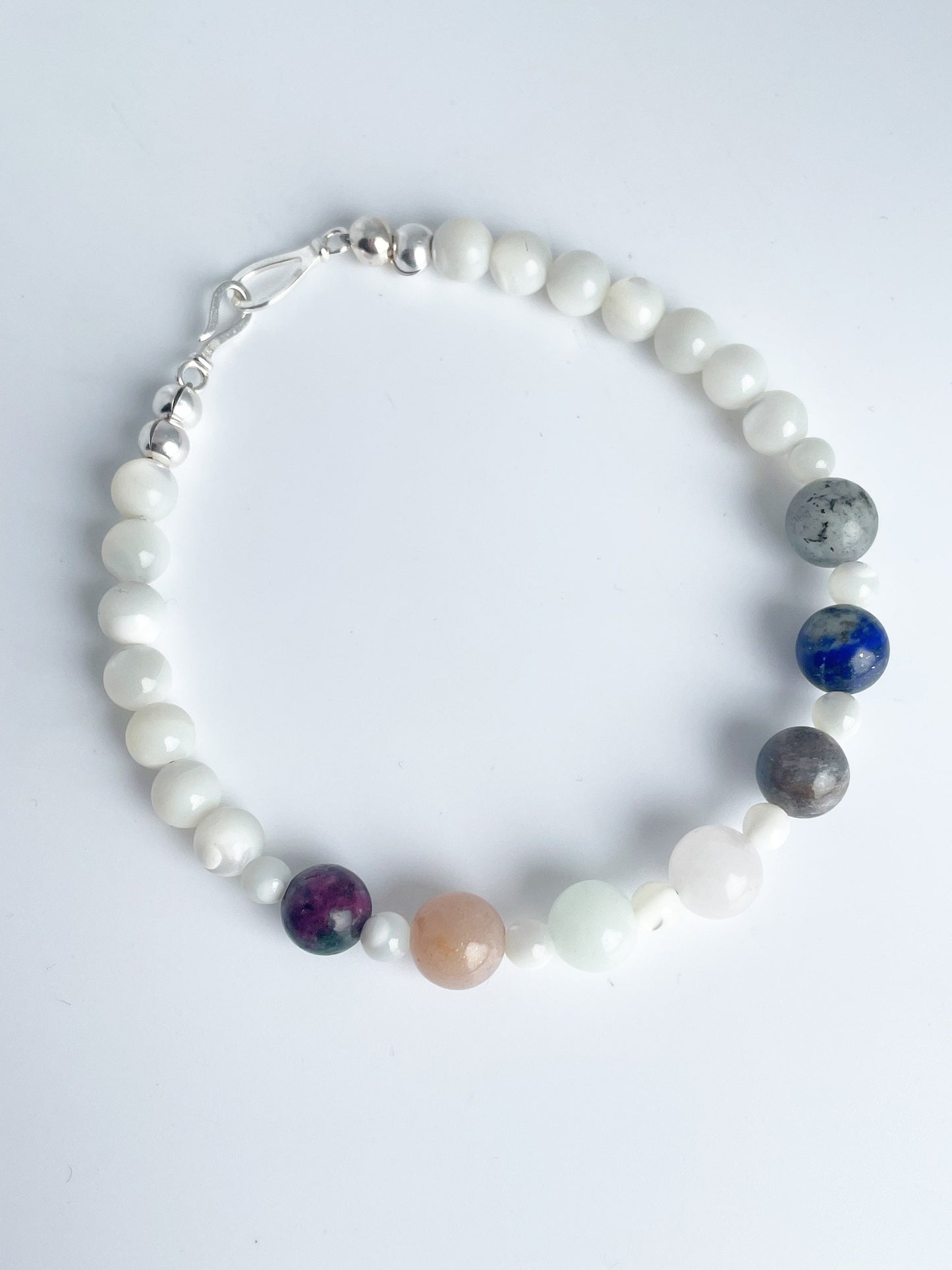 Chakra Gemstone Bracelet with Mother of Pearl, Ruby Zoisite, Sunstone, Green Cave Calcite, Rose Quartz, Blue Kyanite, Lapis, Labradorite