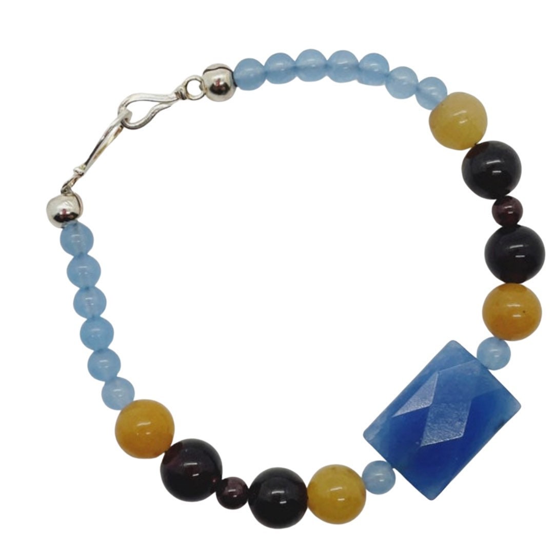 Crystal Gemstone Breathbeads Bracelet. Garnet, Blue Serpentine, Blue Agate and Sterling Silver.  Blue, light blue, black and mustard yellow.